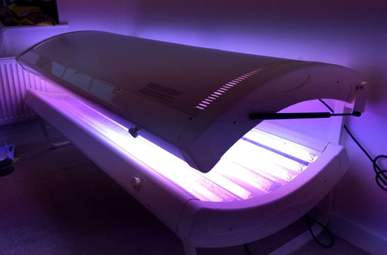 tanning bed om and lit up