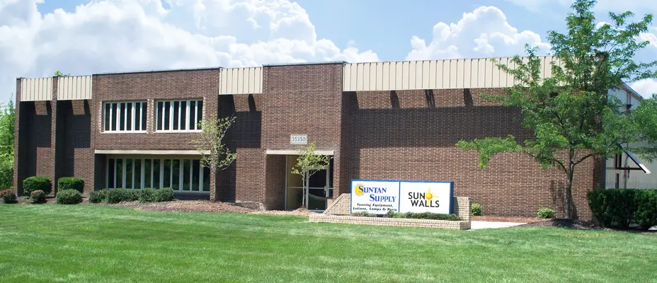 A building with grass in front of it