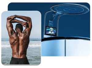 A man is flexing his muscles on the beach