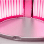 A pink light in the middle of a room.
