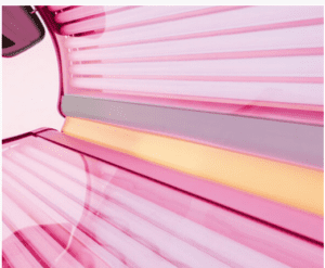 A pink tanning bed with many shades of pink.